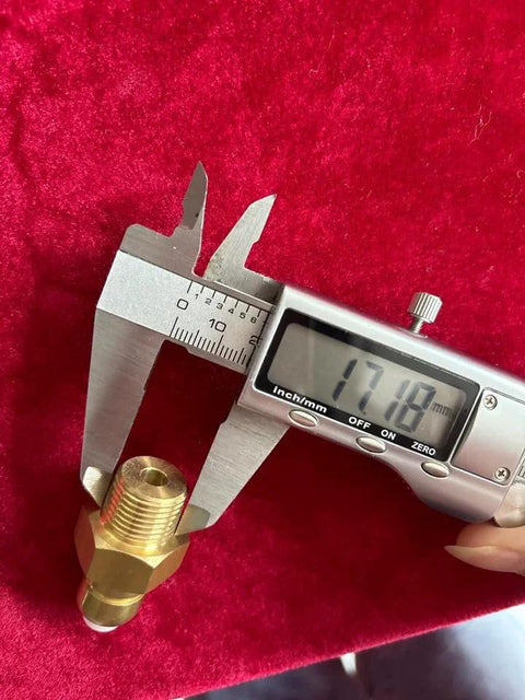 Brass thermal relief valve, 3/8 in NPT for pressure washer pump; caliper shows ~17.2 mm.