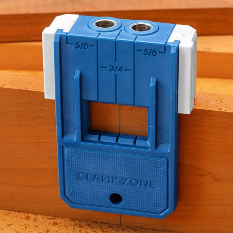 One Half Inch Doweling Jig Kit With Drill Bit And Stop Collar for precise joints, shown clamped on wood for alignment.