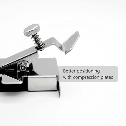 Close-up of magnetic seam guide foot for sewing machines; chrome metal with screw and spring.