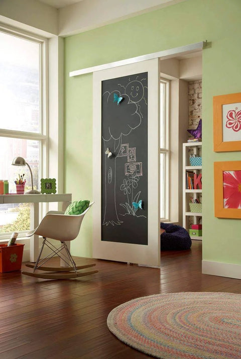 Pro Grade Wall Mount Barn Door Hardware Kit For Doors From One Inch To One And Three Quarter Inches Thick Top Hung Aluminum Track With Nylon Hangers Beefy Heavy Duty Up To Two Hundred Lbs installed in a living room space.