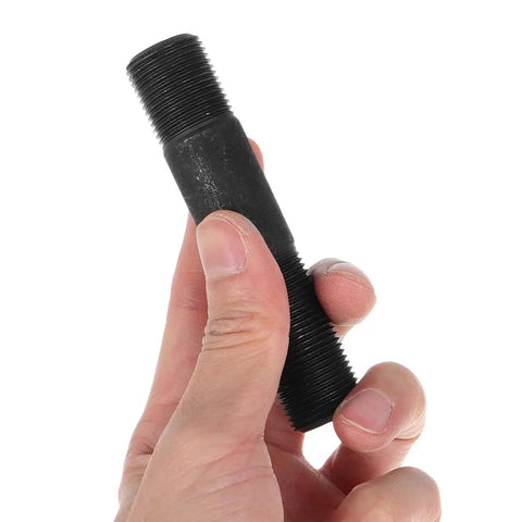 Hand holding a part of the Heavy Duty Hydraulic Punch Driver Kit With Pull Rod Lock Cap For Quick Easy Manual Hole Knockout In Metal Sheets Conduit and Electrical Work All In One Set With Cylinders And Drivers