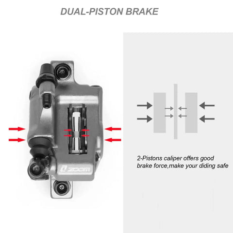 Front view of gray dual-piston hydraulic disc brake caliper for MTB use