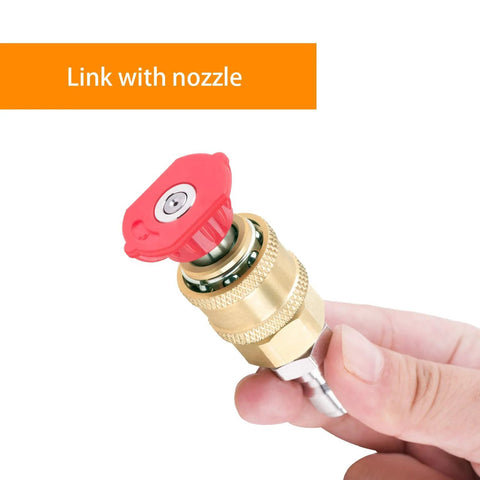 Brass pressure washer quick-connect coupler with red knob, 1/4 inch NPT female end, held by hand