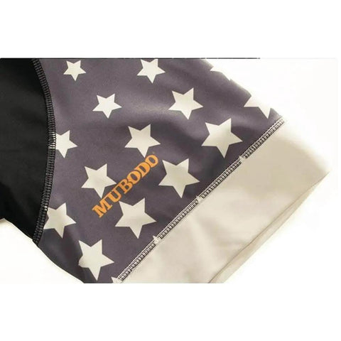 Close-up of a fabric sleeve with white stars on a gray background and 'MUBODO' in orange letters, showing stitching detail.