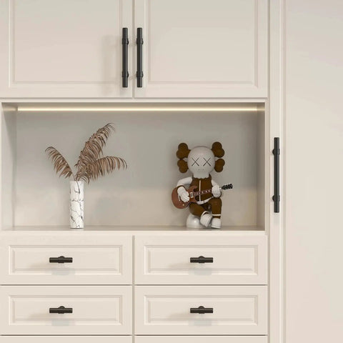 5 Pack Black Cabinet Knobs And Drawer Pulls installed on white cabinetry with modern hardware in kitchen or bathroom setting.