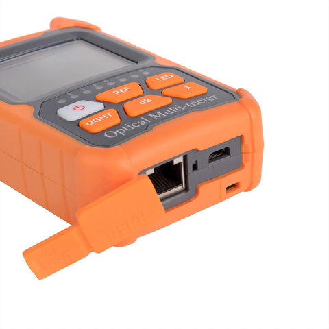 Orange rugged handheld optical power meter with LCD display and orange functional buttons (REF, LED, dB).