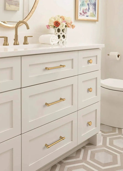 Champagne Bronze Destine Cabinet Pull 5-1/16 Inch Center-To-Center on white bathroom drawers, modern design