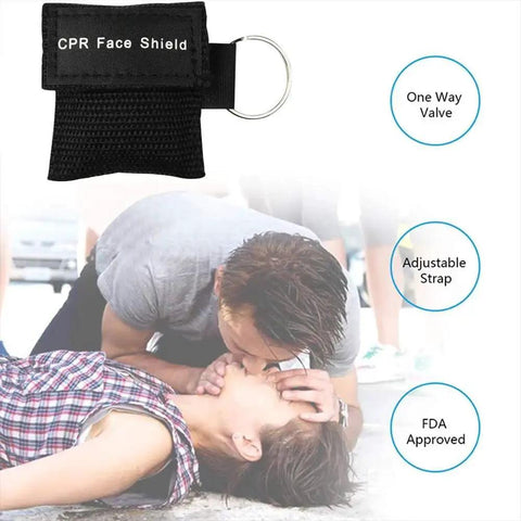 Rescuer using CPR face shield with one way valve; Set Of 50 Portable CPR Masks With One Way Valve Breathing Barriers shown