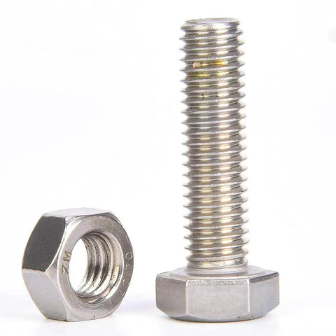 Stainless steel bolt and nut against white background, showcasing threading details.