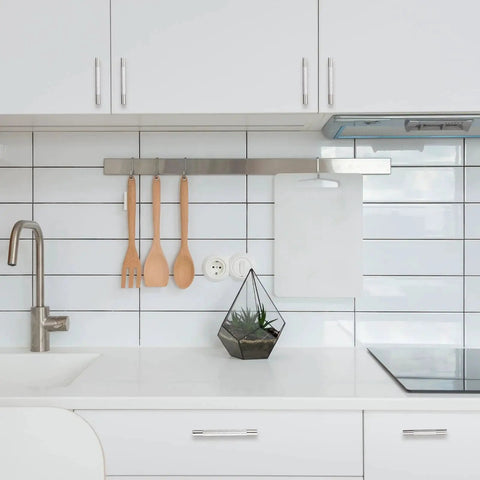 Modern kitchen with white cabinets and 10 pack 5 inch center to center brushed satin nickel knurled cabinet handles installed, sleek design