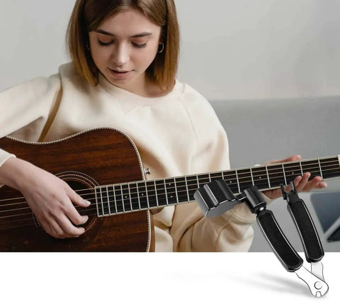 Guitar String Winder Cutter And Pin Puller 3 In 1 Must Have Multifunctional Maintenance Tool displayed in front of acoustic guitar player.