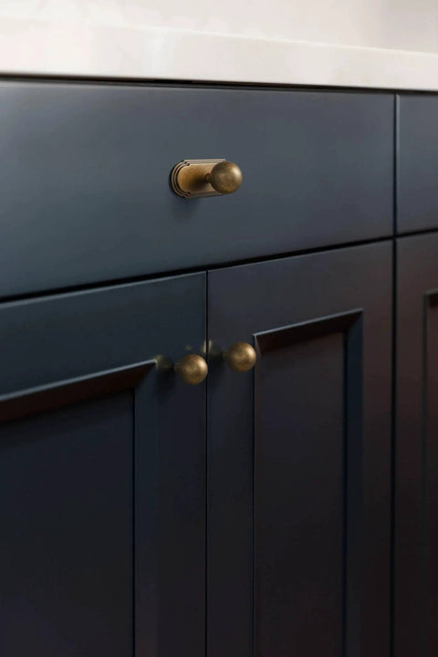 Antique Brass Cabinet Knob With Backplate Set, 24mm Diameter Zinc Alloy Hardware, installed on dark kitchen cabinet