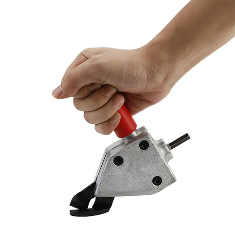 Hand holding Metal Nibbler Drill Attachment For 12V Electric Drills Turns Your Tool Into A Beast Power Shear, ergonomic handle visible