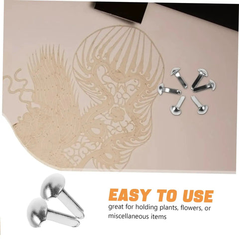 100 Pcs Iron Fasteners For DIY Projects And Scrapbooking Durable Split Pins For Crafting And Puppet Making Kit displayed on paper