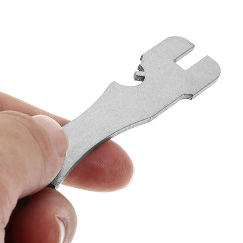 Close-up of a hand holding a stainless steel wrench for 20 Pcs Stainless Steel Left And Right Handed Lag Screws For Deck Cable Railing Hardware Heavy Duty Crimp Threaded Screws Built To Last For Outdoor Wood Stairs Diy Projects.