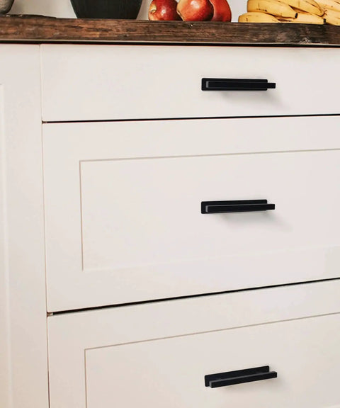 2 Pack Self Adhesive Cabinet Handles Matte Black No Drill Drawer Pulls Stick On Handles for cabinets, easy installation shown on drawers