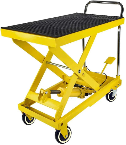 Yellow hydraulic lift table with rubber surface and wheels, designed for heavy-duty lifting. Visible are polyurethane wheels.