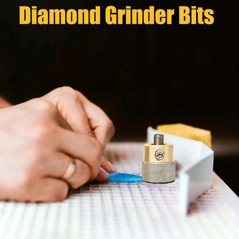 Close-up of 2 Pcs 5/8 Inch Diamond Drill Bit Head for stained glass grinder with brass core on grinding tool surface in use.