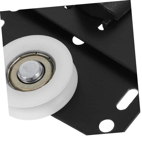 Close-up of heavy-duty sliding door roller kit with black metal wheel for effortless sliding door upgrade with a heavy duty roller and track kit that installs easily, supports high loads, keeps wardrobes and barn doors quiet and stable, and delivers smooth operation for cabinets.