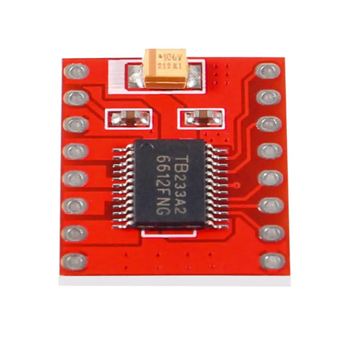Close-up of TB6612FNG Dual DC Motor Driver Module for two motors with 1.2A continuous and 3.2A peak current on red circuit board
