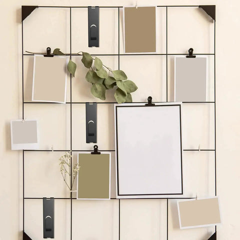 Grid wall panel with black 15 Pack Gridwall Notch Hooks Black Utility Hangers for display and organizing.