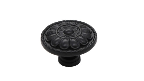 8 Pack Black Vintage Dresser Drawer Knobs Pulls For Cabinets And Cupboards With 1.25 Inch Single Hole Hardware Zinc Alloy Handle Set Includes 16 Screws In Two Lengths 25mm And 40mm front view showing intricate design.