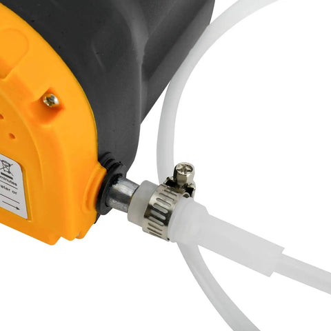 Close-up of Portable 12V 60W Oil Extractor Pump For Fluid Changes with hose connection for cars and equipment