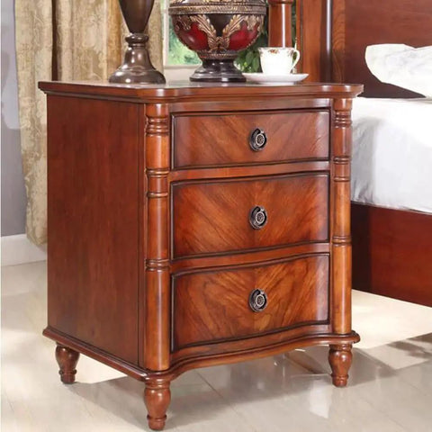 Bedroom nightstand with vintage oil rubbed bronze ring pulls for cabinets and drawers, 2 inch diameter, complimenting wood finish.
