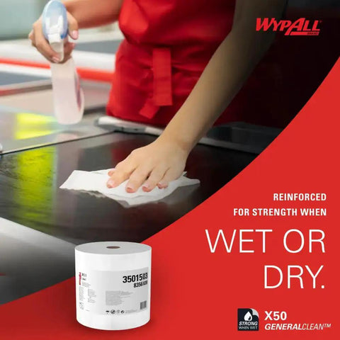 Worker using GeneralClean X50 Cleaning Cloths Jumbo Roll 1100 Sheets White Heavy Duty Wipes for quick cleanups on a countertop
