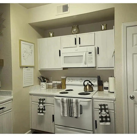 Kitchen with cabinets featuring 16 Pack Self Stick Push Pull Helper ABS Plastic Wardrobe Handle For Cabinets And Drawers in black.