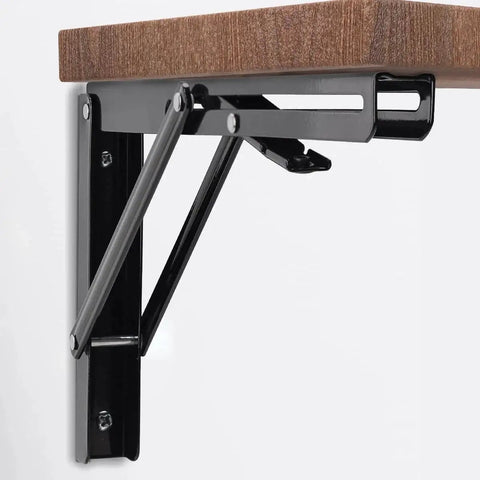Side view of Heavy Duty 16 Inch Folding Shelf Brackets Pack Of 2 By YUMORE Black L Bracket Hinge installed under wooden surface.