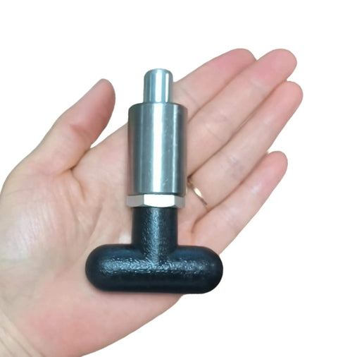 Beefy Three-Eighths Inch Spring-Loaded Pull Pin With T-Handle, steel plunger dowel pin held in hand for size reference