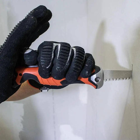 Heavy Duty Folding Jab Saw With Lockback for drywall use, shown cutting with carbon steel blade, glove holds handle firmly
