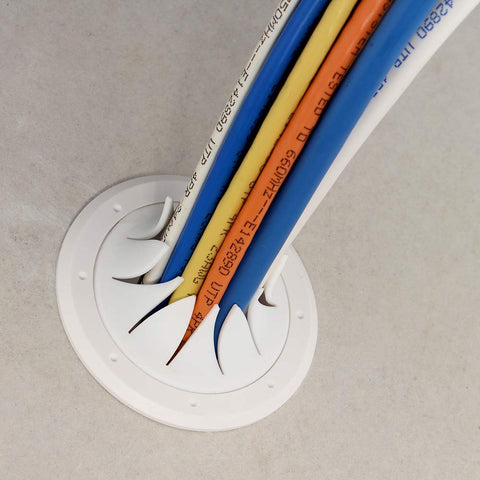 Speedy’Z Spring-Lock Cable Pass Port, 2-inch, white circular wall plate with colored cables threading through.