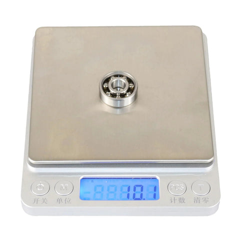 KABOBEARING 608 open deep groove ball bearing on digital scale, 8x22x7mm, nylon cage