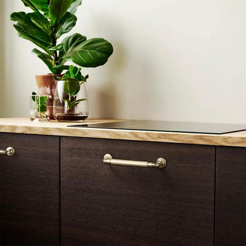 Champagne Bronze Reeded Cabinet Pulls Six Pack 5 Inch Sleek Modern Textured Drawer Handles on dark wood kitchen cabinetry