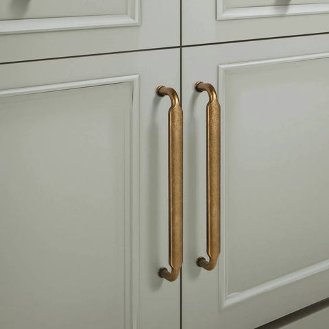 5 Inch Hole Center Antique Brass Cabinet Pulls Zinc Alloy Kitchen Drawer Pulls installed on white cabinet doors