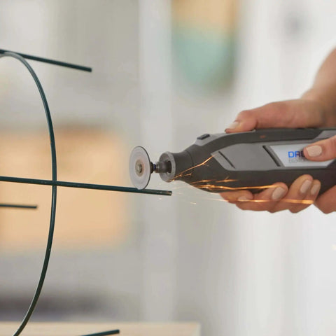 EZ Lock Starter Kit For Rotary Tools With One And A Half Inch Cut Off Wheels Includes EZ402 Mandrel in use cutting metal