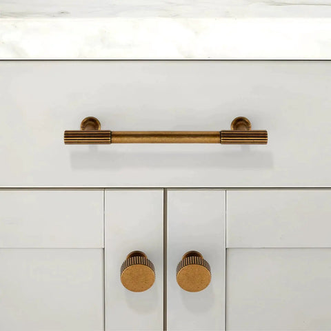 Antique Brass Cabinet Knobs 10 Pack 28mm Round Single Hole Drawer Pulls For Kitchen Cabinets And Furniture installed on white cabinet