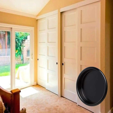 4 Pack Closet Door Finger Pulls 2 1 8 Inch Black Round Insert Door Handle on sliding barn doors in cozy room setting.