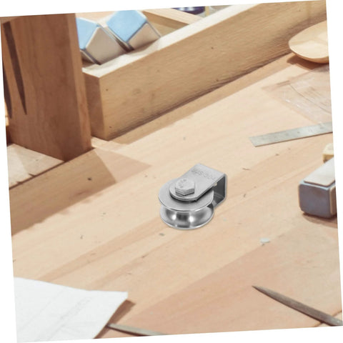Stainless Steel Door Pulley Wheel Built Tough Track Roller For Sliding Gates Smooth Operation And Quiet Performance Durable Gate Roller For Doors And Lifting Equipment Easy Installation on workbench