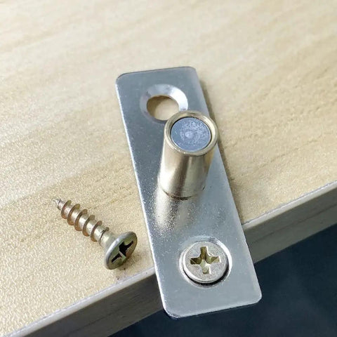 Close-up of stainless steel guide and screws from 4 Piece Roller Guide Set For Sliding Barn Doors In Stainless Steel Floor Guides For Track Hardware Durable Barn Door Accessories With Smooth Operation And Easy Installation Size 45mm Length 15mm Width 13mm Height.