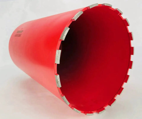 Close-up of a 10 Inch Diamond Wet Core Drill Bit for Concrete Rebar Asphalt Brick Rock Masonry One And One Quarter Inch Threaded Barrel Core Drill BLUEROCK Tools Beefy Heavy Duty Wet Core Drilling