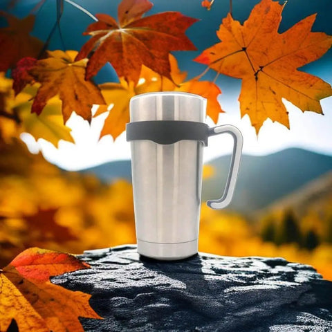 No Slip 20 Oz Tumbler Handle For Vacuum Insulated Mugs in black, easy grip travel cup holder on a rock with autumn leaves background.