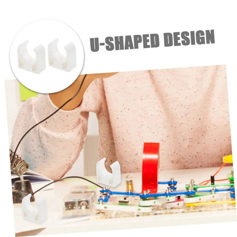 U-shaped design of 20 Piece Small Electric Motor Clamp Bracket Mounting Brackets For DC Brush Motors Geared R280 Compatible Built For DIY Toy Builds And Hobby Projects Sturdy Secure Heavy Duty Motor Mount shown in a DIY project setup.