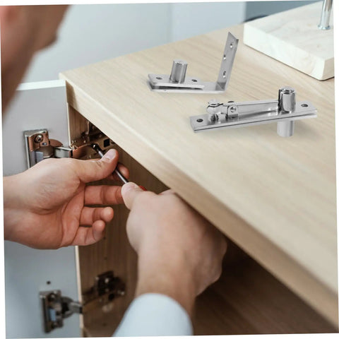 Person installing Heavy Duty Pivot Hinge Kit For Doors And Cabinets Concealed Hidden Hinge System For DIY Secret Door Projects Crossed Pivot Concealed Hinge With Hardware Included on wooden cabinet