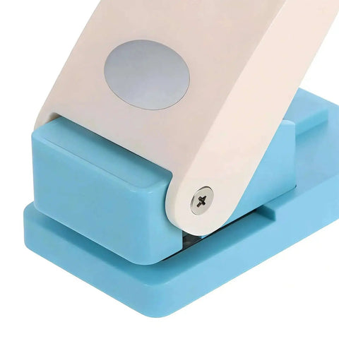 Close-up of Portable Oval Tab Punch For Scrapbooking And Card Making with smooth cut steel blade and easy grip handle
