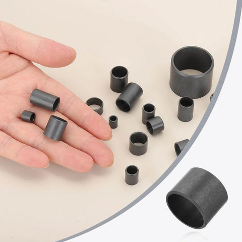 Close-up of 6 Pcs POM Sleeve Bearings 30mm ID By 34mm OD By 26mm Length Self Lubricating Oilless Black Bushings in hand and laid out