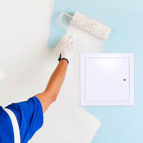 QWORK 10x10 flush aluminum access door panel, white powder-coated finish, mounted on drywall and being painted.