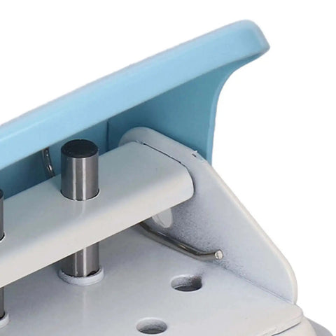 Close-up of 3 Hole Paper Puncher Handheld DIY Tool For B5 Papers Up To 5 Sheets Of 70G with metal body and plastic cover